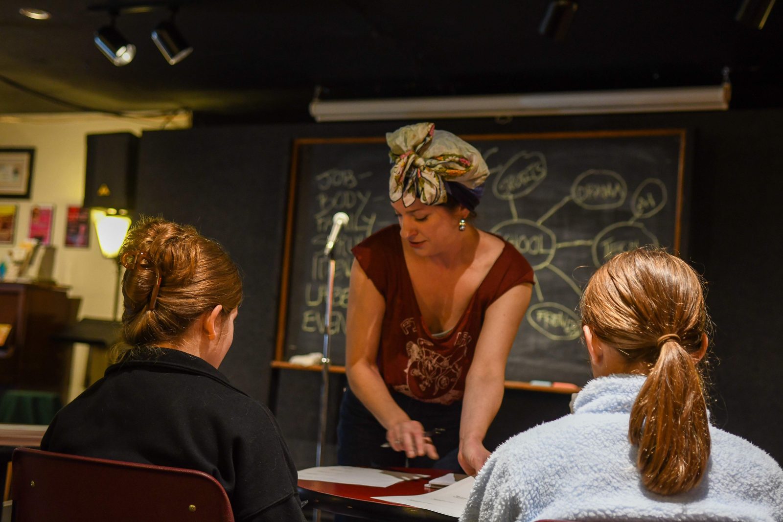 Joke writing workshop in progress around a table