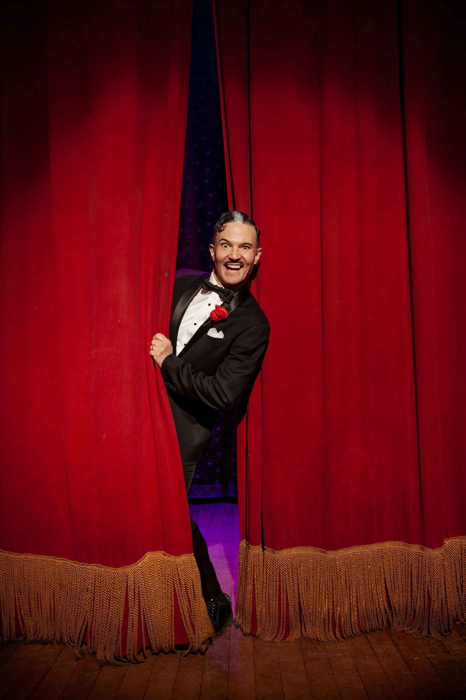 A comedian on stage at the Catskills Comedy Festival