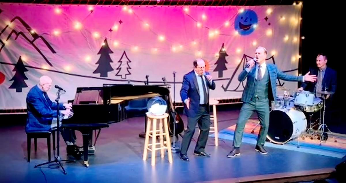 Vaudeville-style musical act with piano and singers